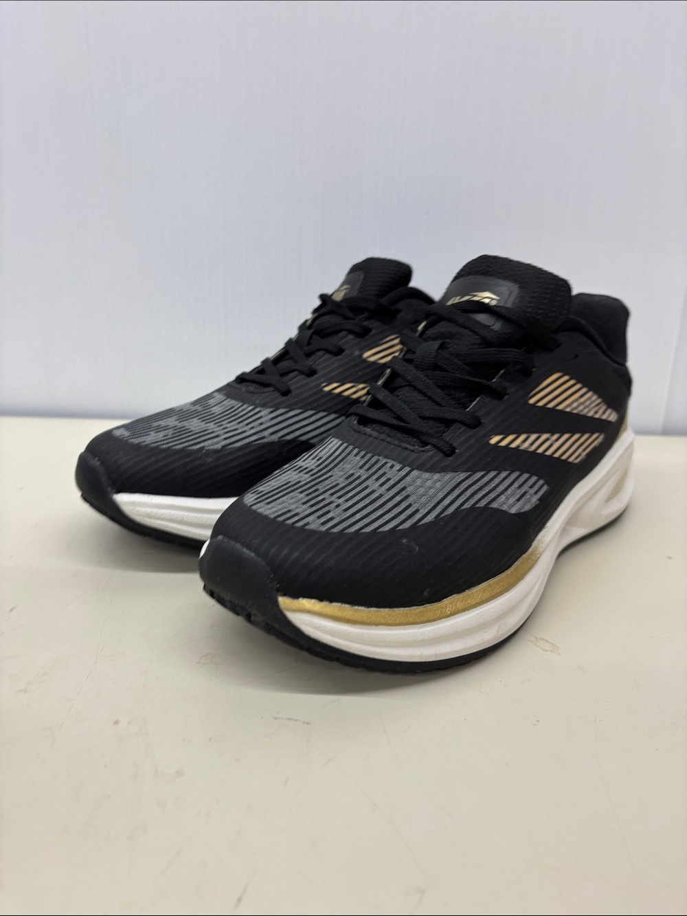 Avia Black and Gold Men's Athletic Running Shoes